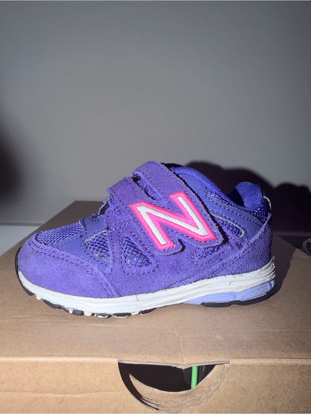 New Balance Kids Purple Velcro Sneaker with Pink Logo Accent size 5
